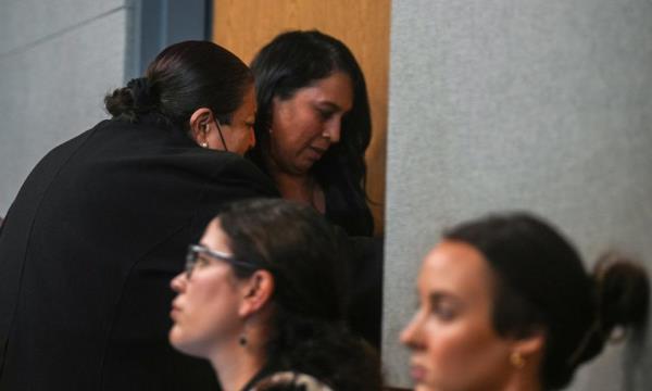 Brenda Ramos is overcome with emotion Wednesday as she leaves the murder trial of Austin police officer Christopher Taylor after watching a video of her son, Michael Ramos, getting shot by Taylor.
