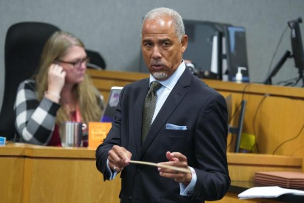 Prosecutor Gary Cobb questions police Detective Benjamin Hart about the Michael Ramos shooting. Cobb asked Hart if he felt that his decision not to shoot Ramos was "reasonable." Hart said it was.